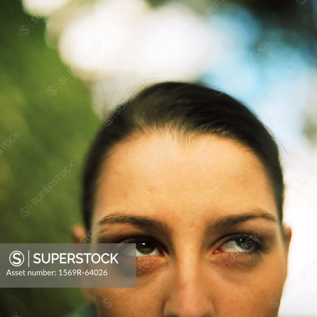 Partial view of woman´s face looking up, close up, portrait