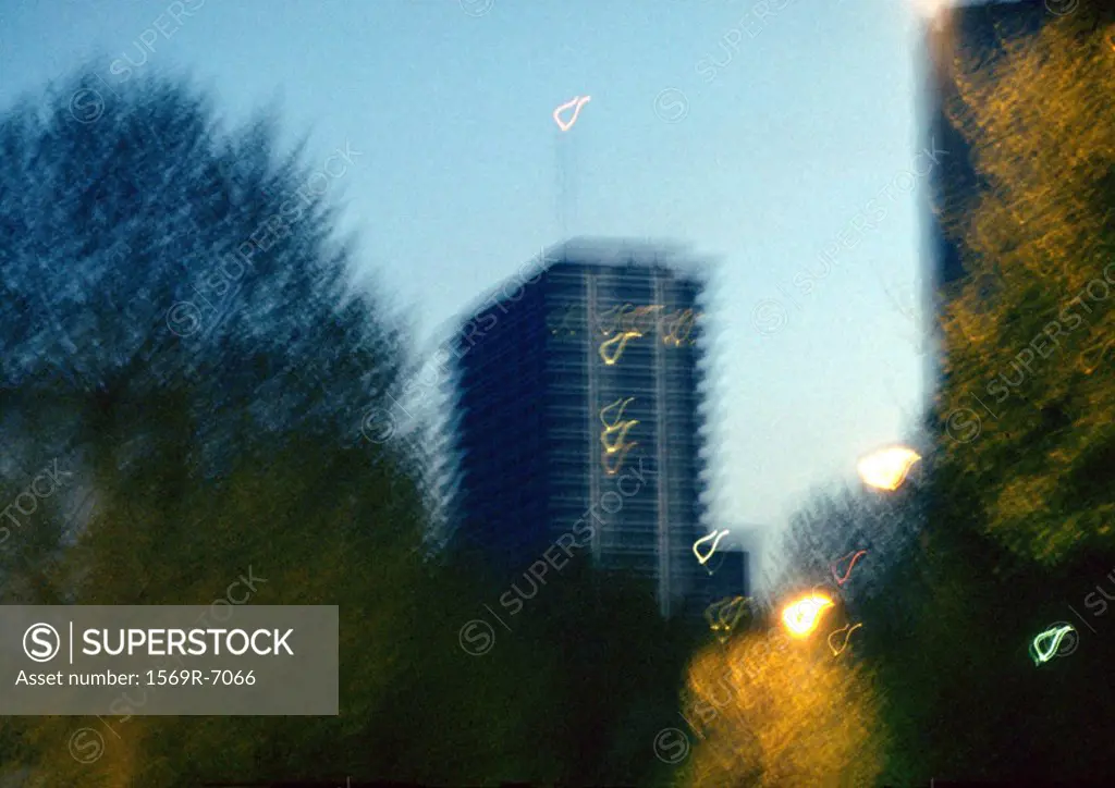 France, Paris, building and trees, blurred