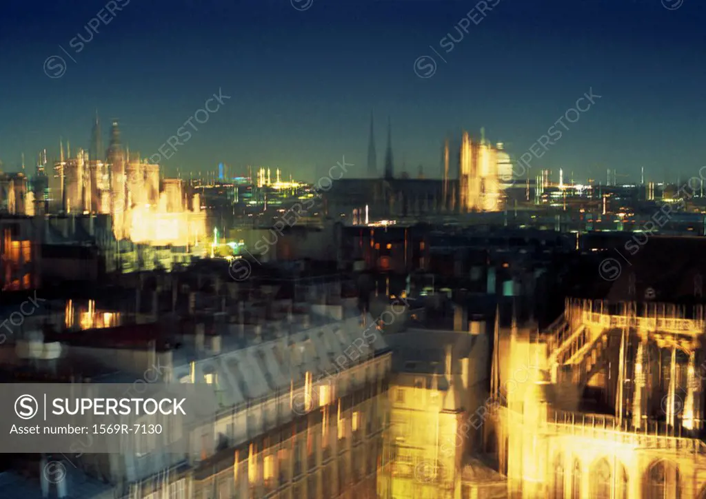 France, Paris, rooftops at night, blurred