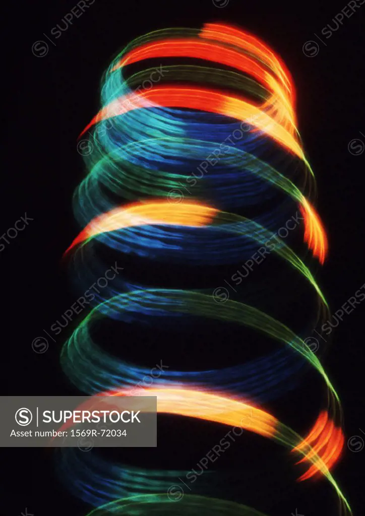 Spiraling light effect, reds, blues and yellows