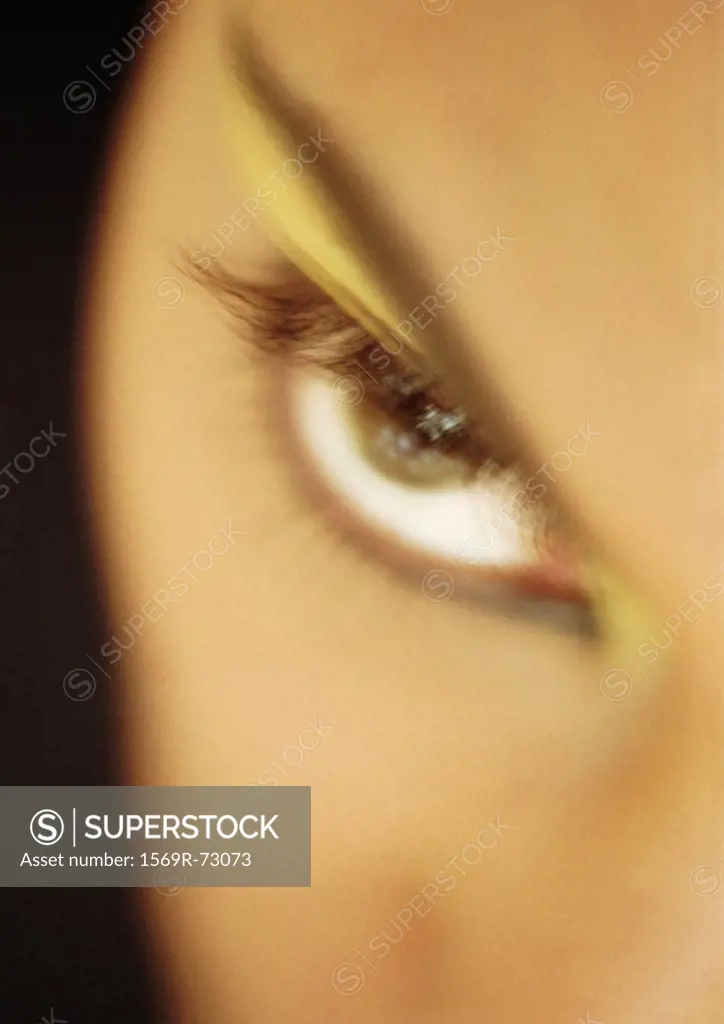 Woman´s made-up eye, blurred close-up