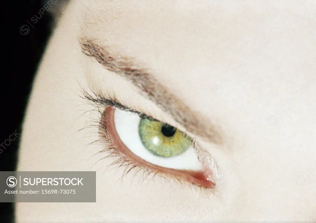 Woman´s green eye, close up