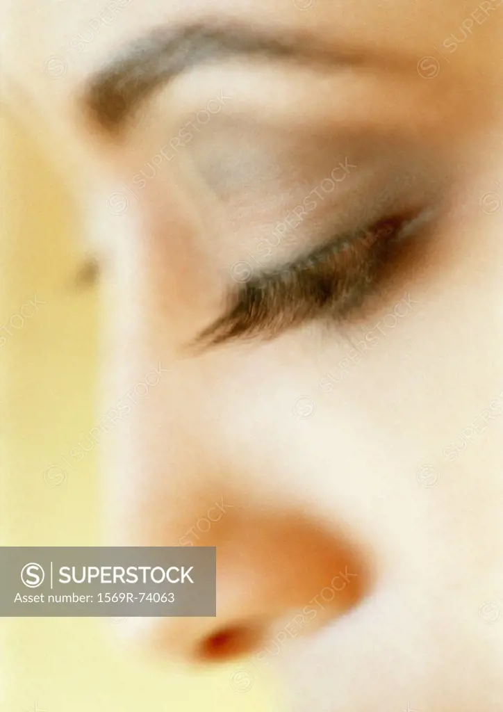 Woman´s lowered eye, close-up