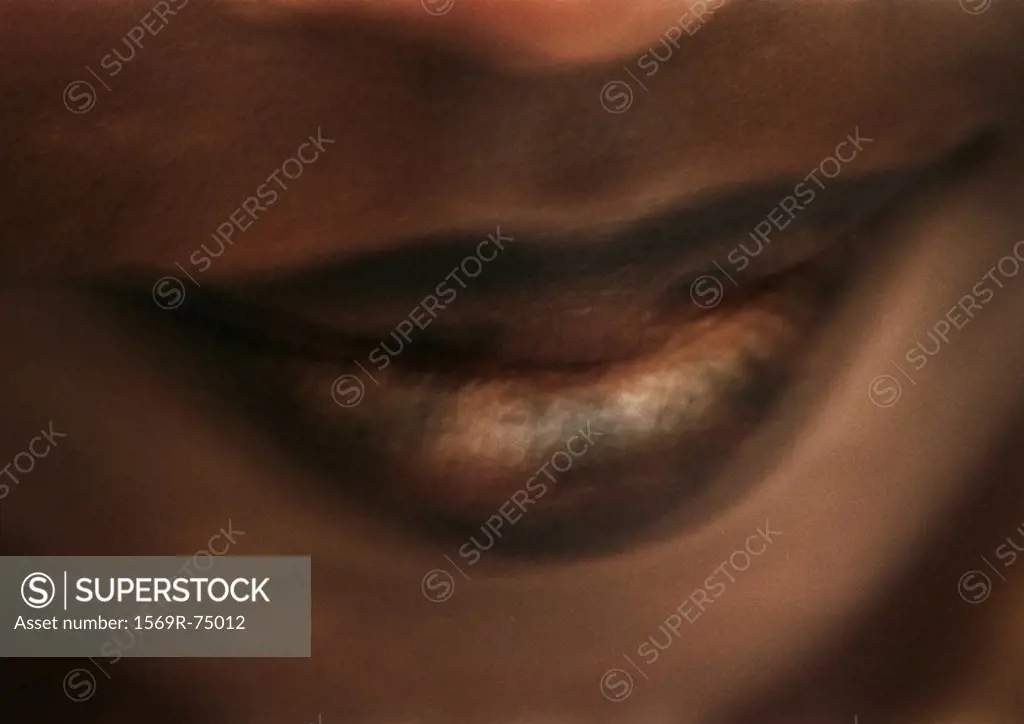 Woman wearing dark lipstick, close up of mouth, blurred