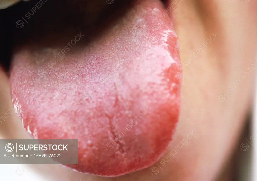 Close up of woman sticking tongue out