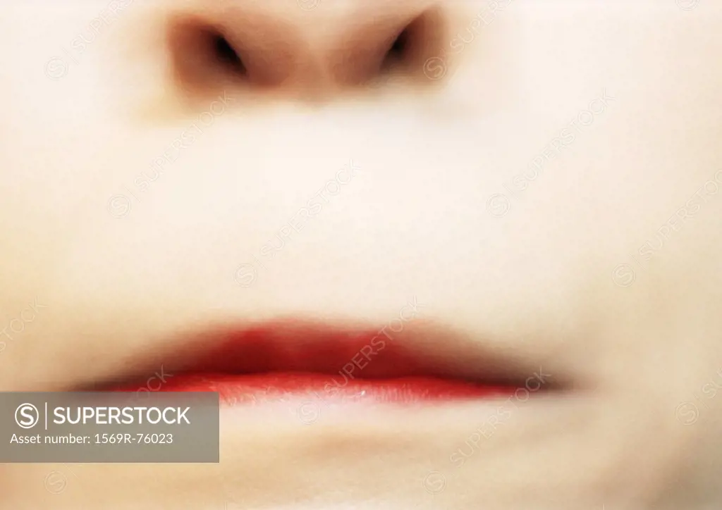 Close up of woman´s pursed lips, blurry
