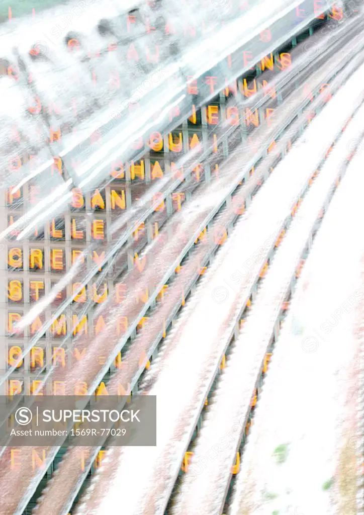 Traintracks superimposed on departure board