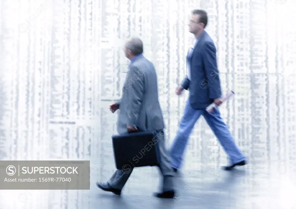 Two men walking on stock quotes, montage