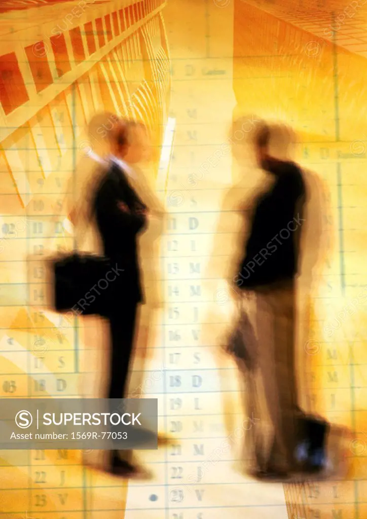 Businessmen standing on calendar, montage