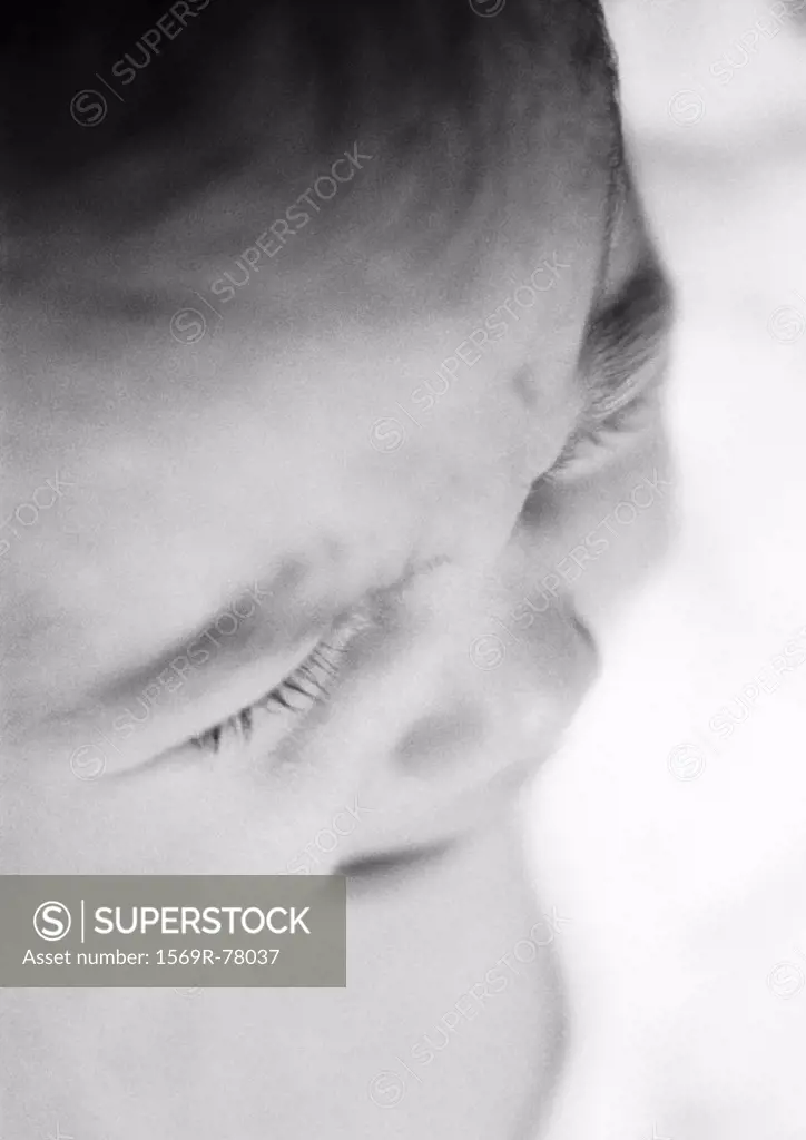 Baby crying, close-up, high angle view, B&W