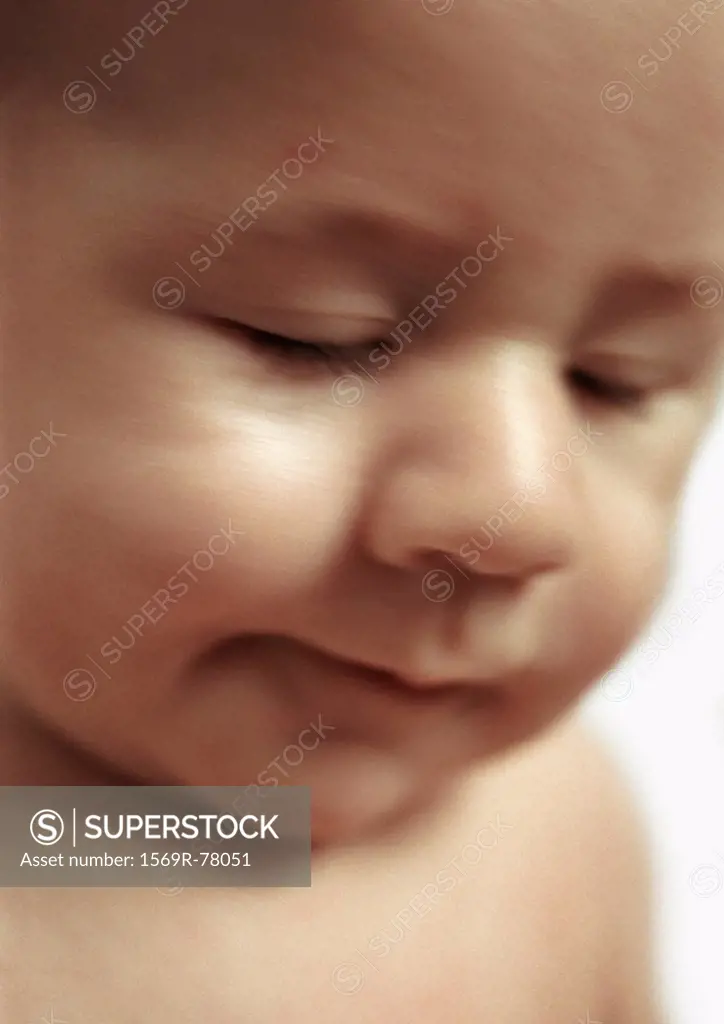 Baby with eyes closed, close-up, side view