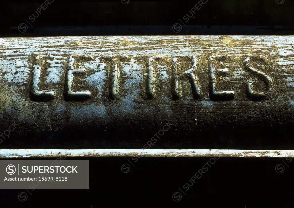 ´Letters´ typography embossed in French on dirty surface