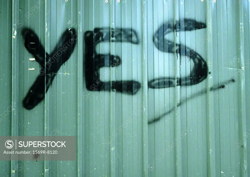 ´Yes´ text painted on wall