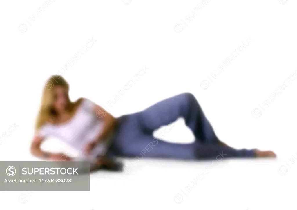 Silhouette of woman on side, on white background, defocused