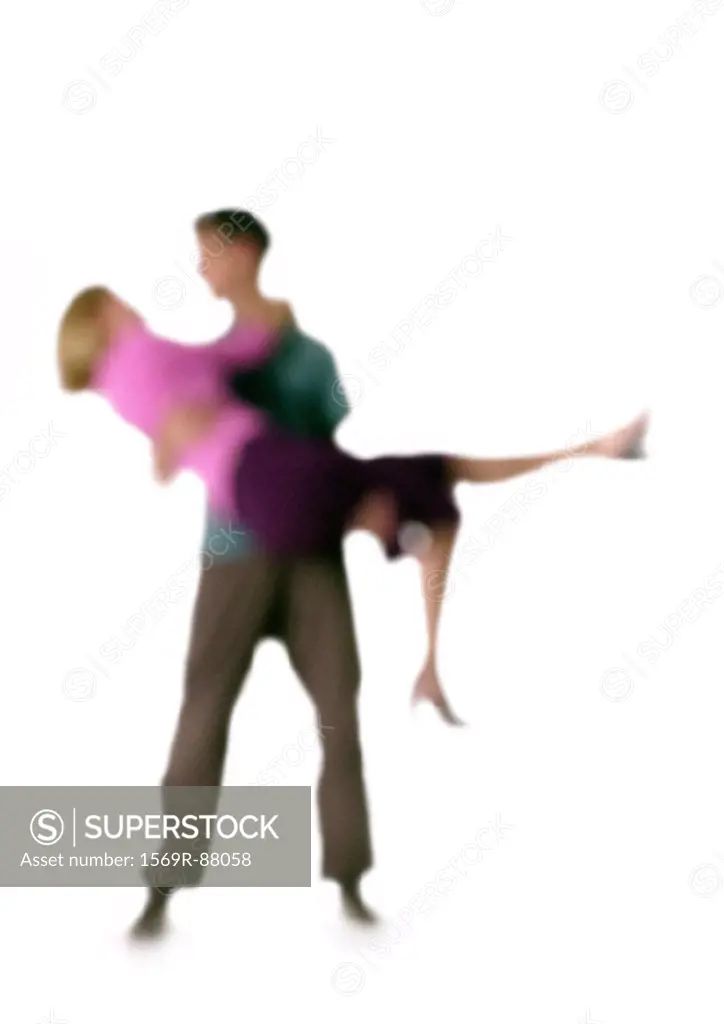 Silhouette of man holding woman in arms, on white background, defocused