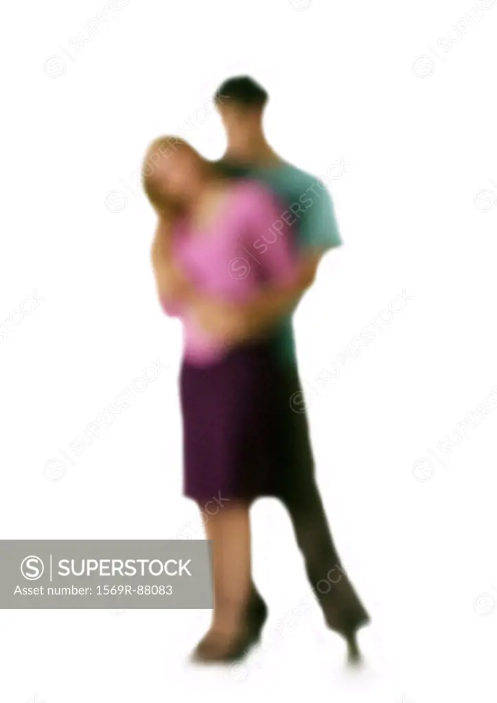 Silhouette of man embracing woman from behind, on white background, defocused