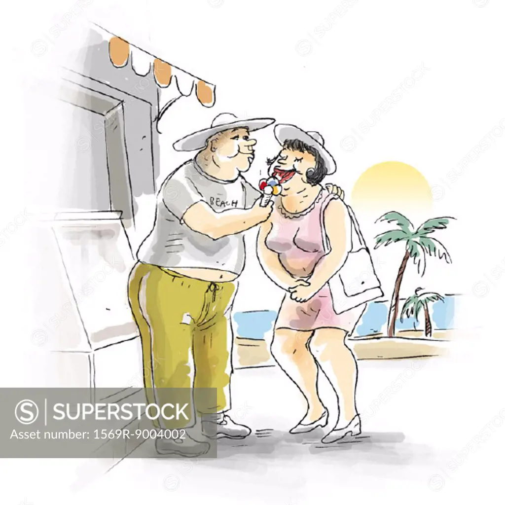 Couple eating ice cream on beach