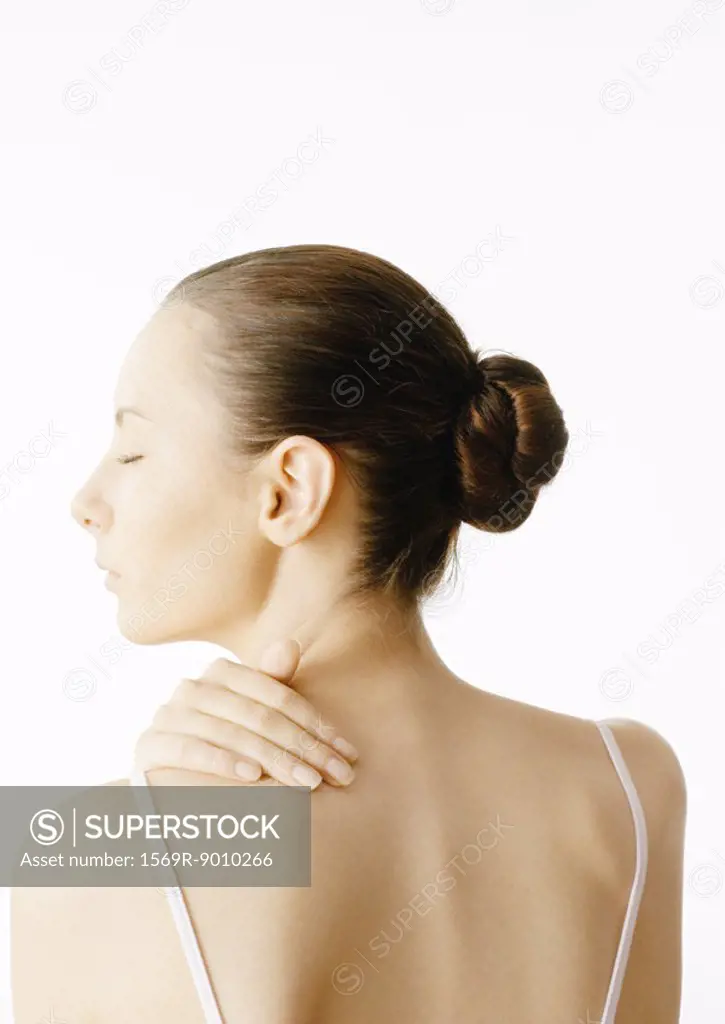 Woman with hand on back