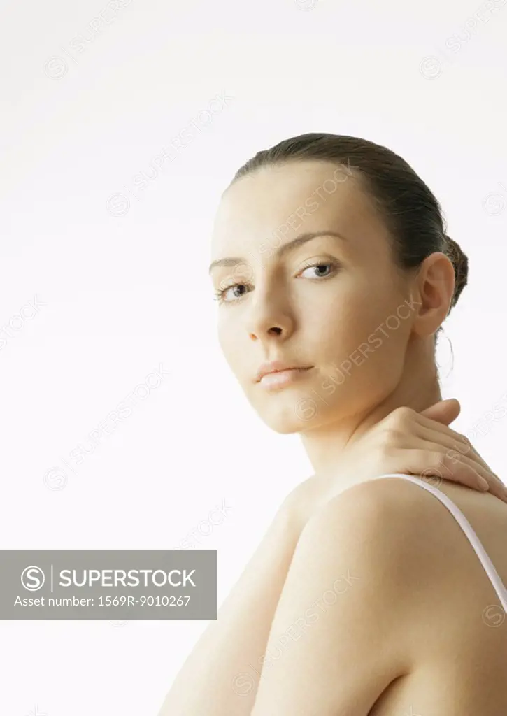 Woman with hand on back