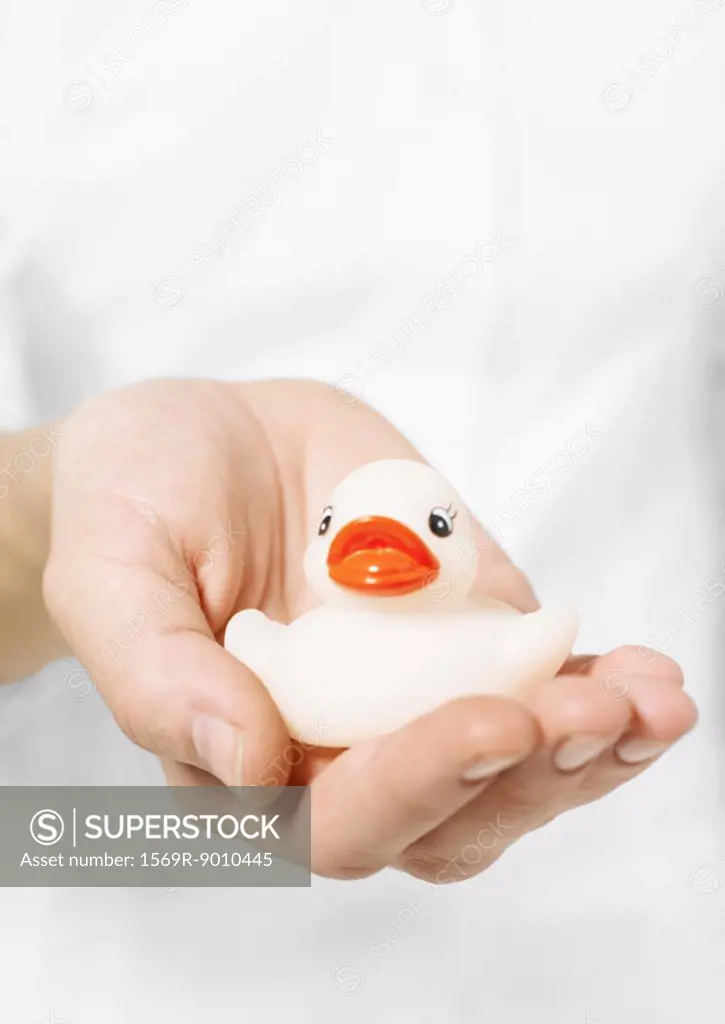 Hand holding rubber duck