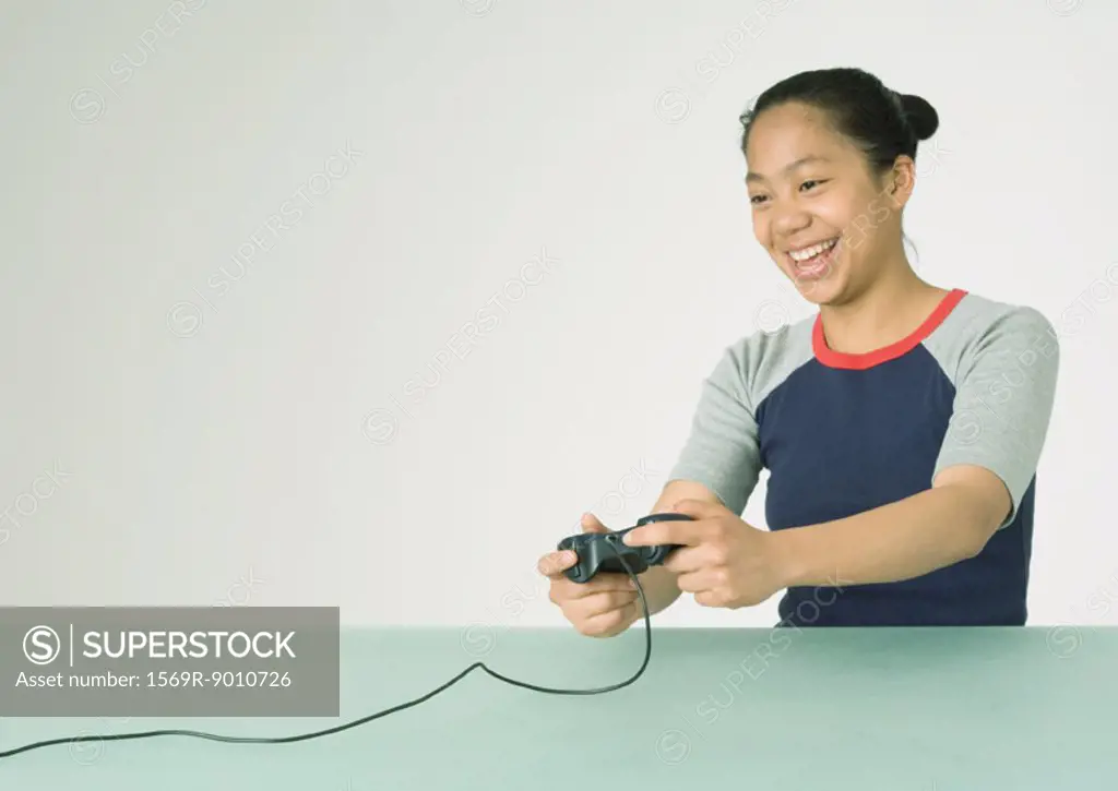 Young woman playing video game