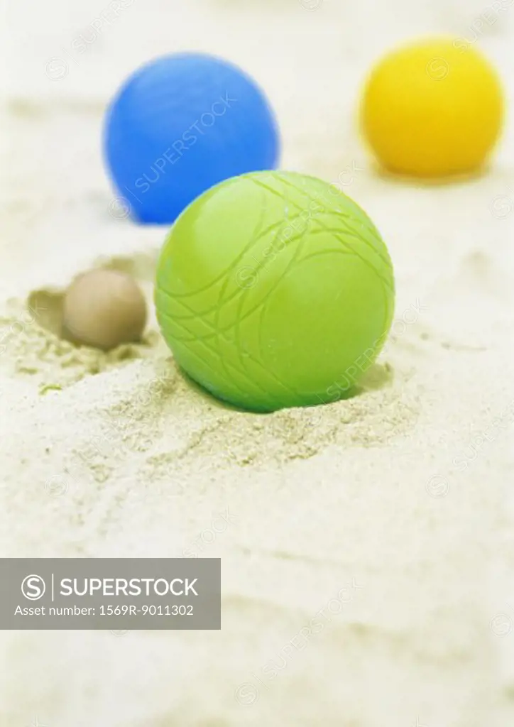 Petanque balls in sand