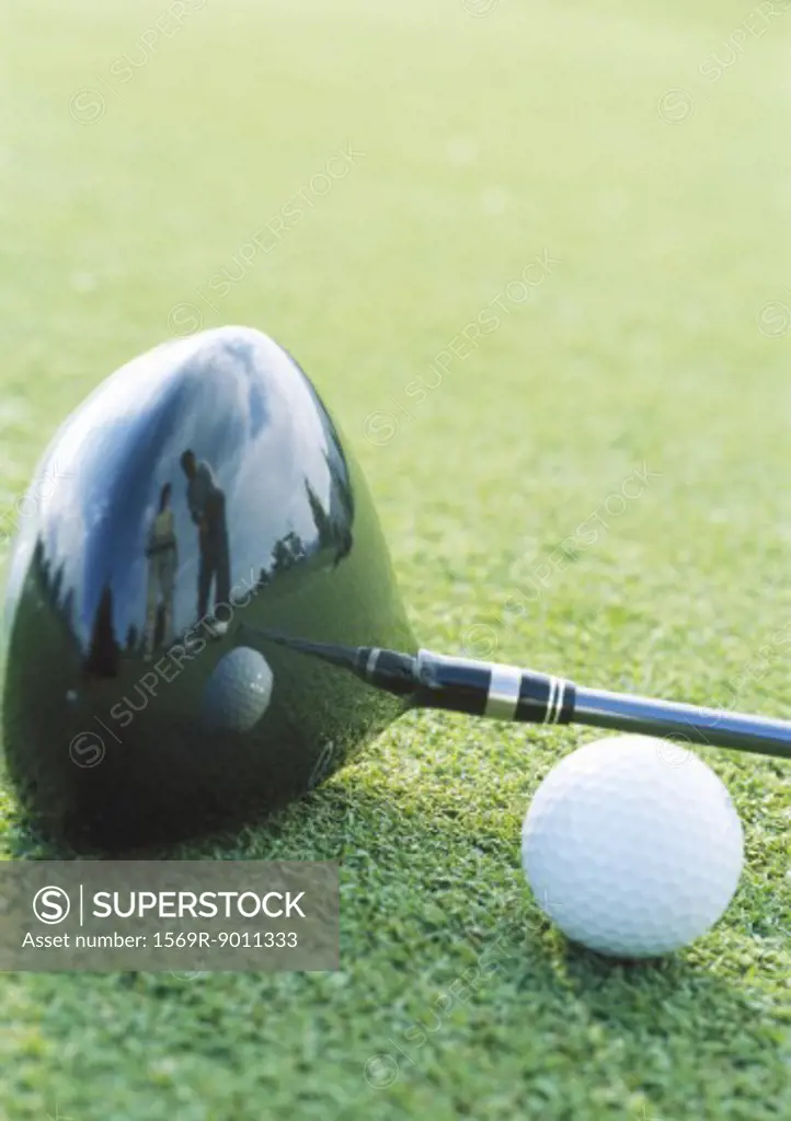Golf ball and club, close-up