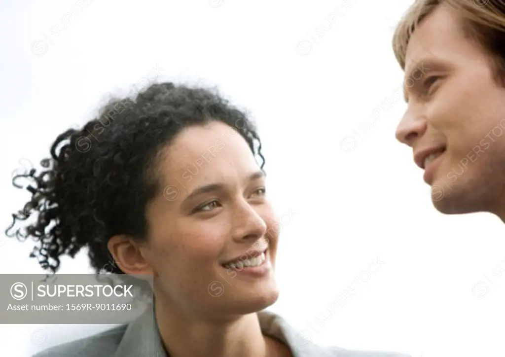 Woman and man conversing