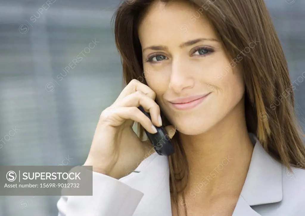 Business woman using cell phone