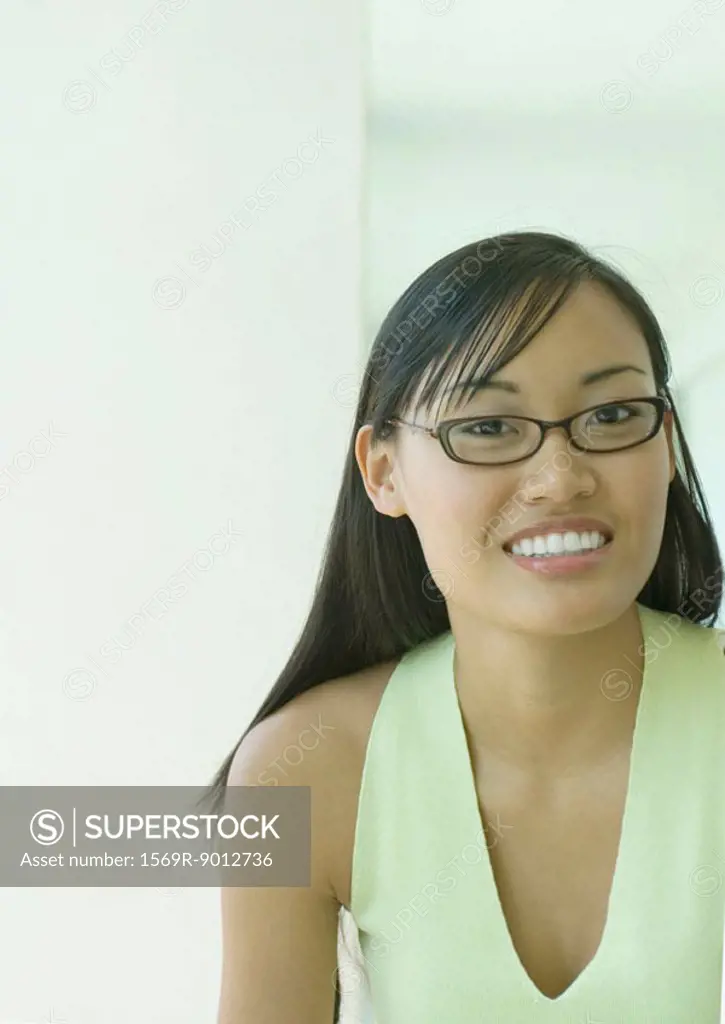 Young woman wearing glasses, portrait