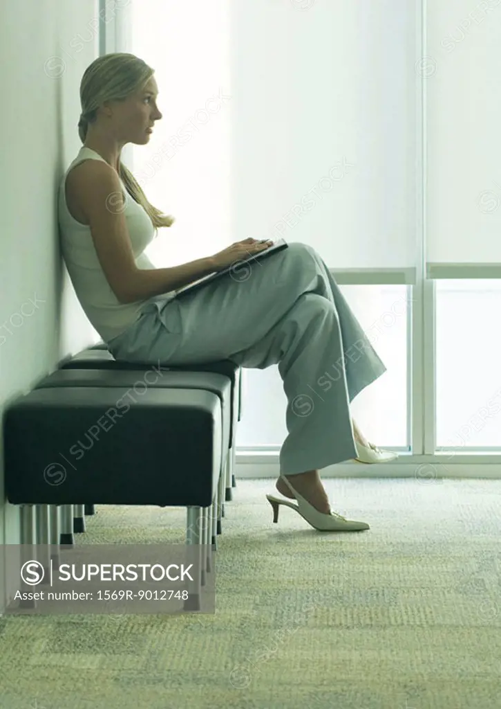 Woman sitting in waiting room