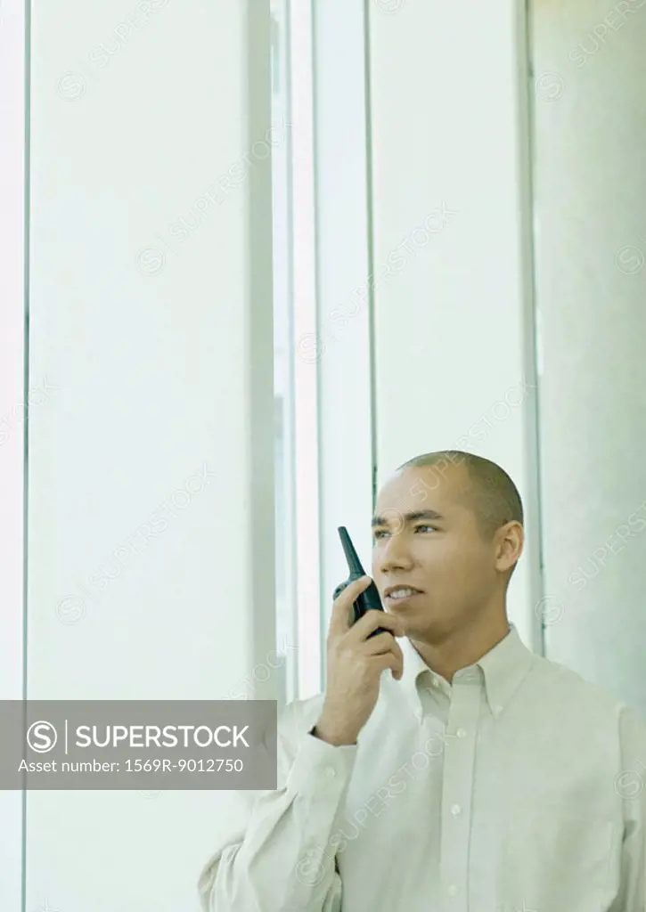 Man using walkie-talkie