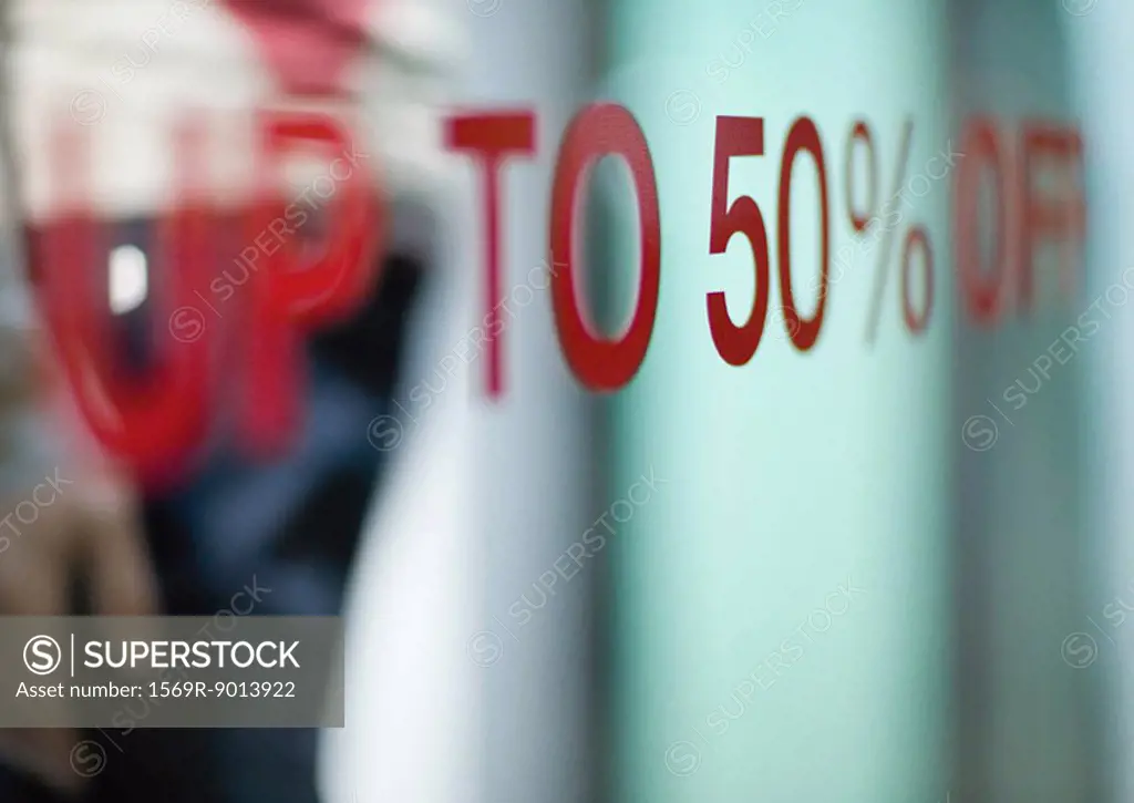 ´Up to 50 off´ text on shop window