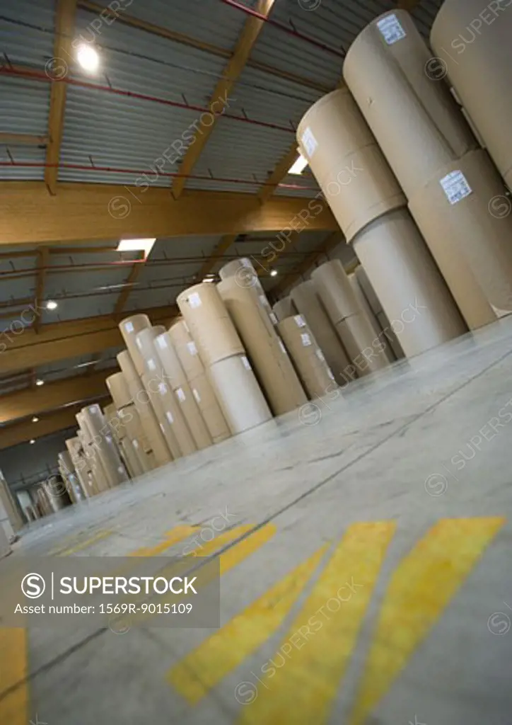 Warehouse containing rolls of paper