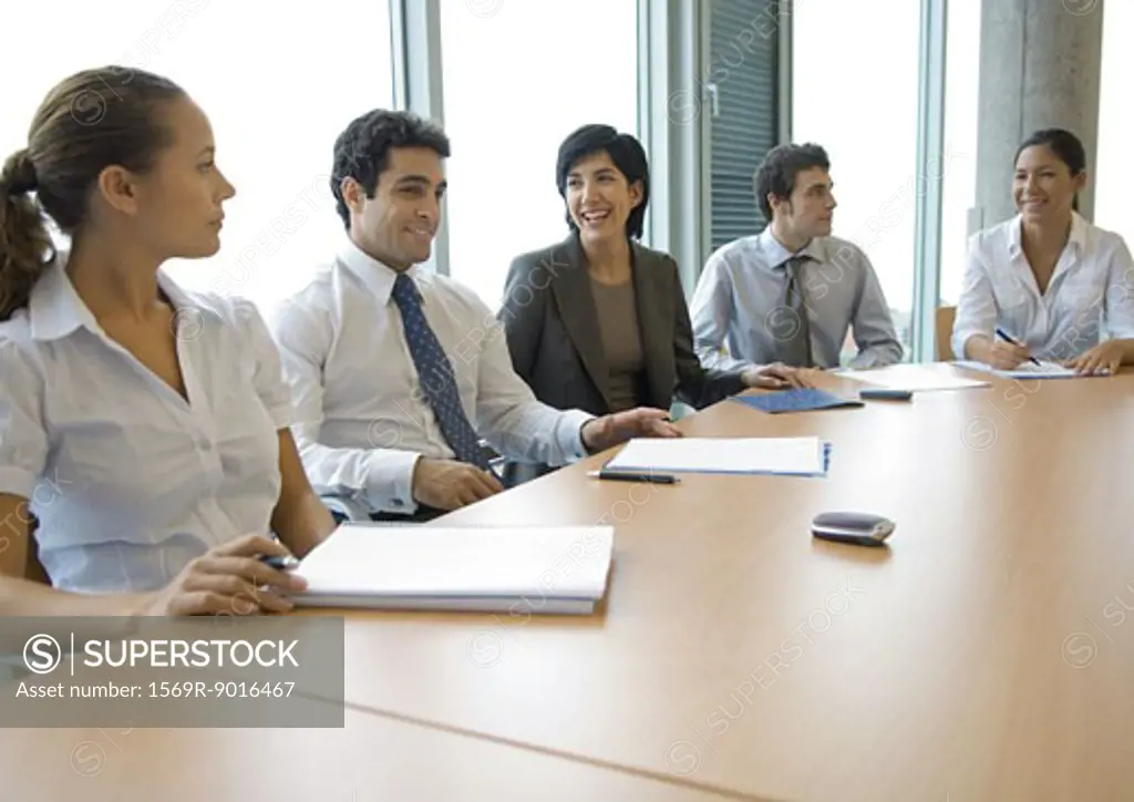Business associates sitting at conference table