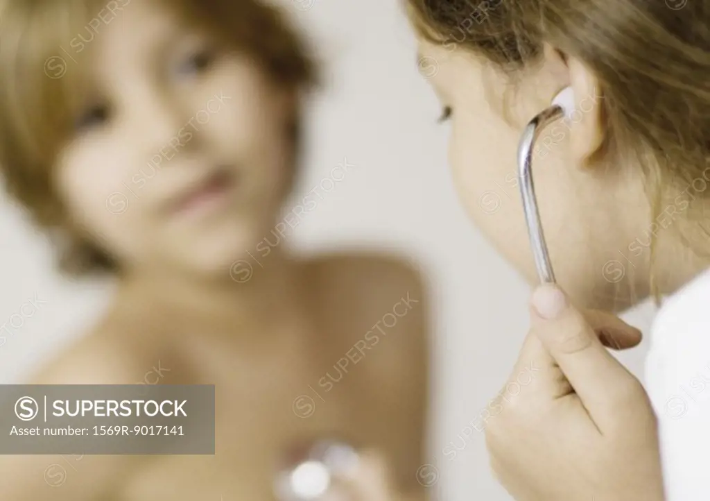 Children playing doctor with stethoscope