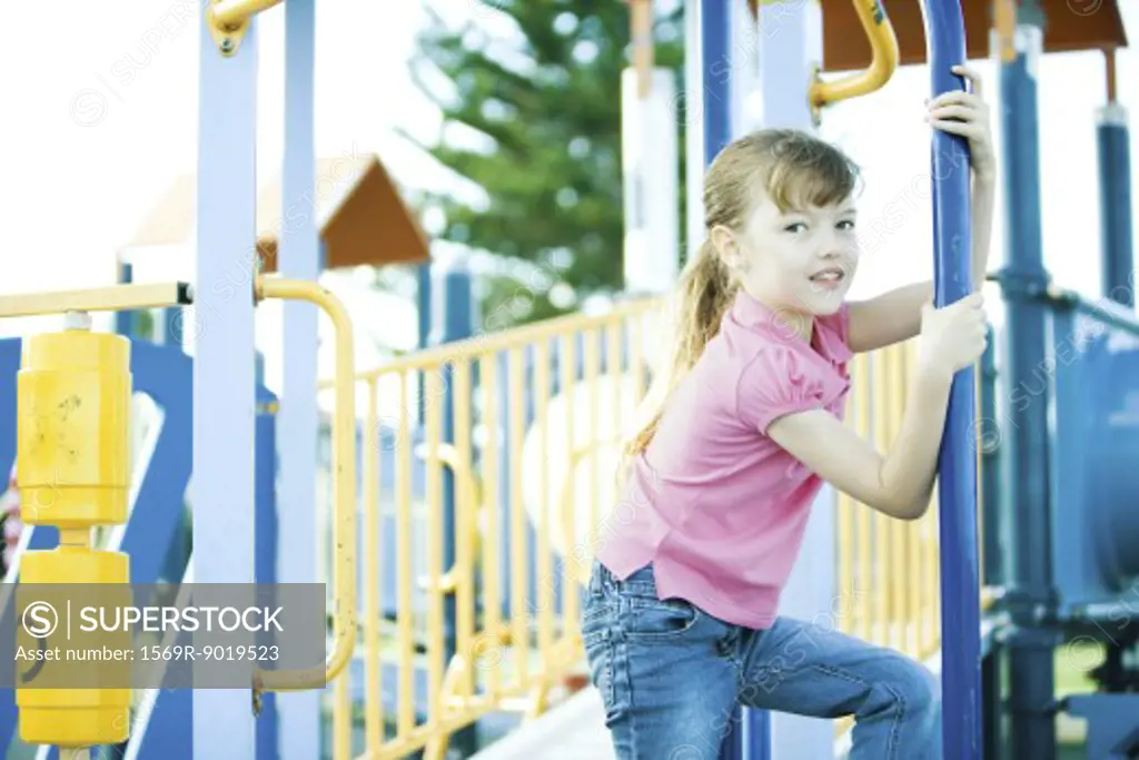 Child on playground equipment