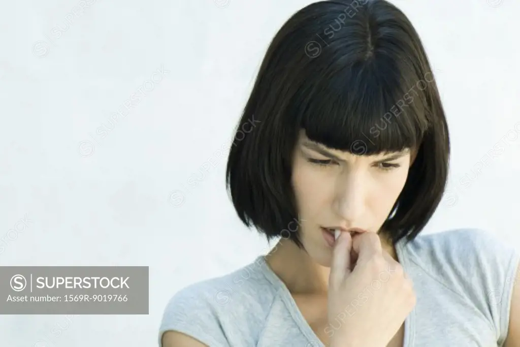 Woman, biting fingers, portrait