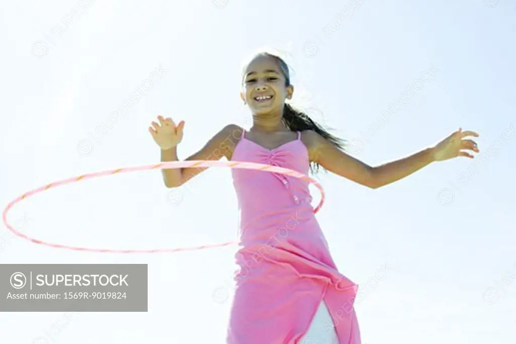 Girl with hoola hoop