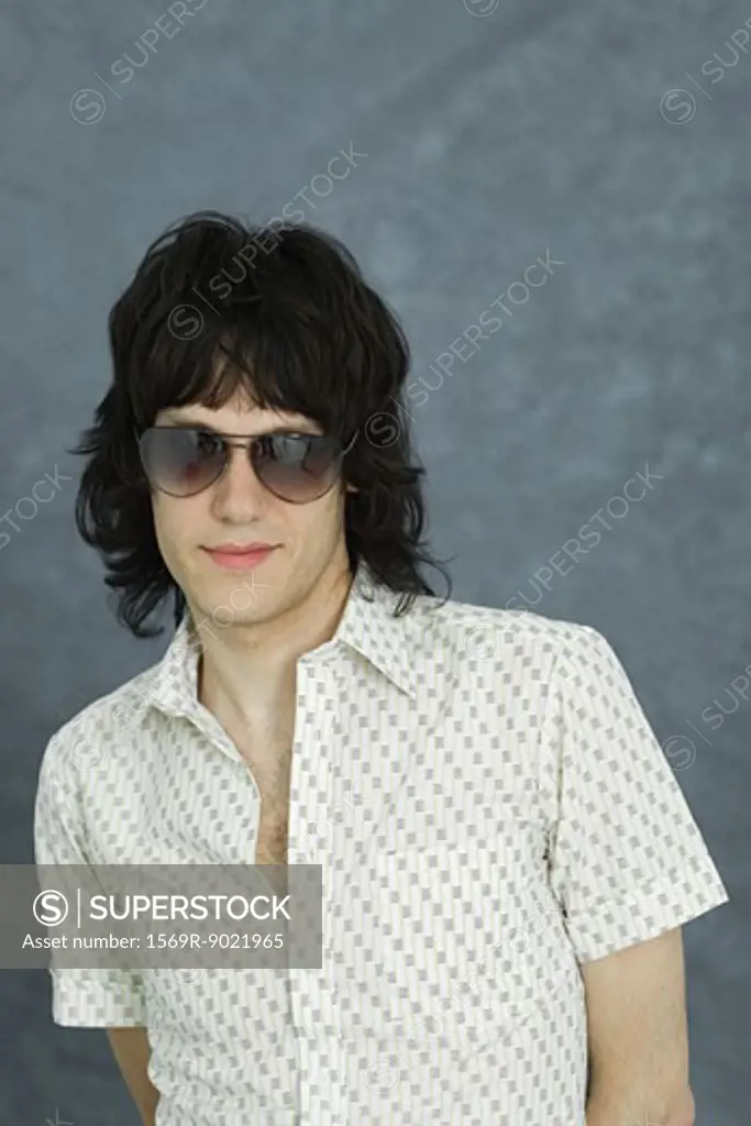 Young man wearing sunglasses, portrait