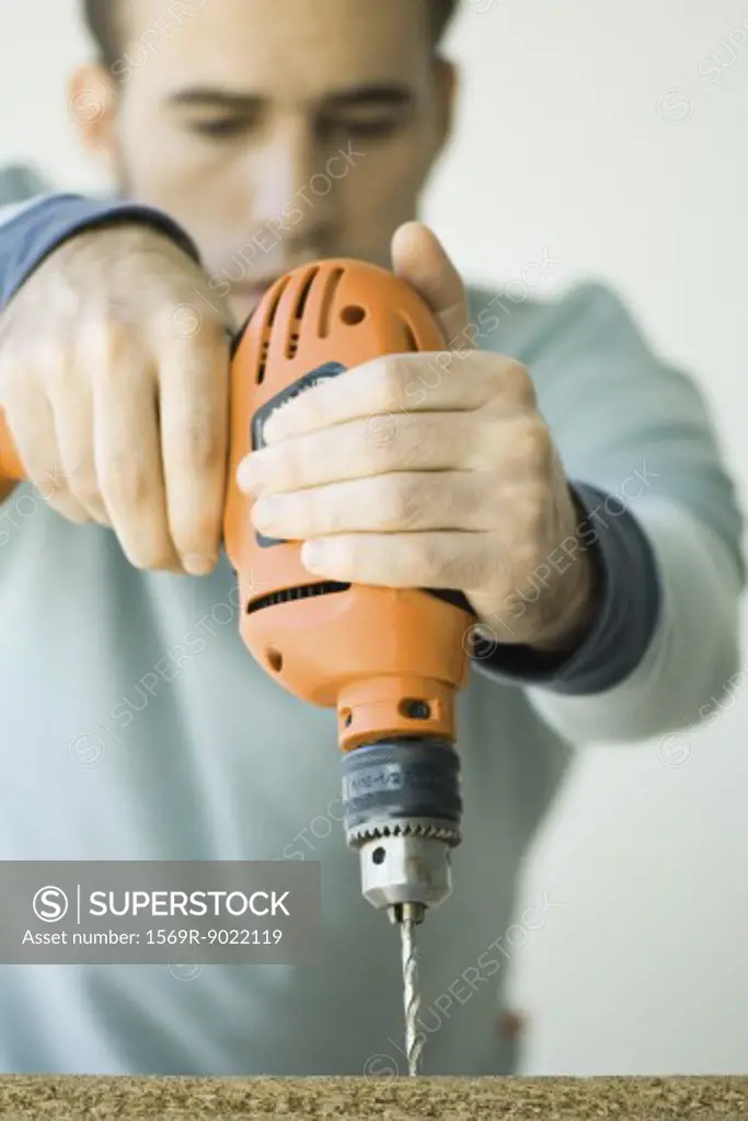 Man using drill