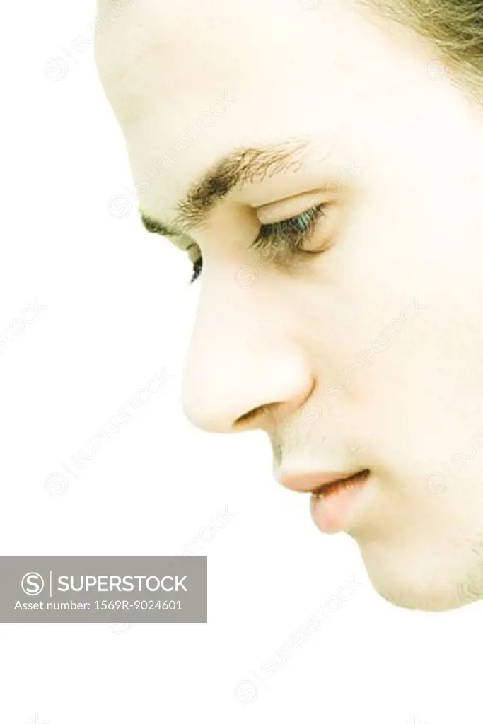 Young man's face, profile, extreme close-up