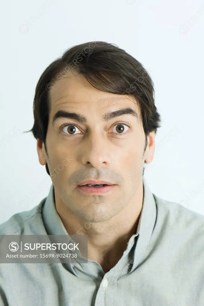 Man making surprised face, portrait
