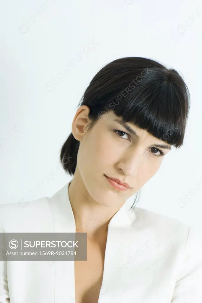 Woman, frowning at camera, portrait