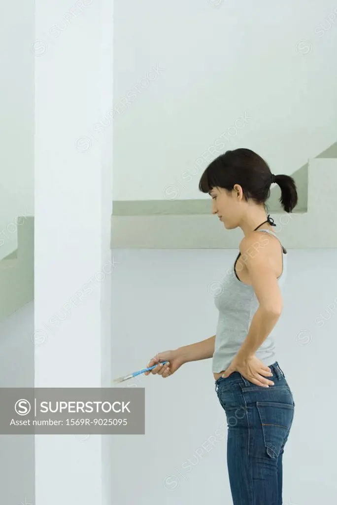 Woman painting post