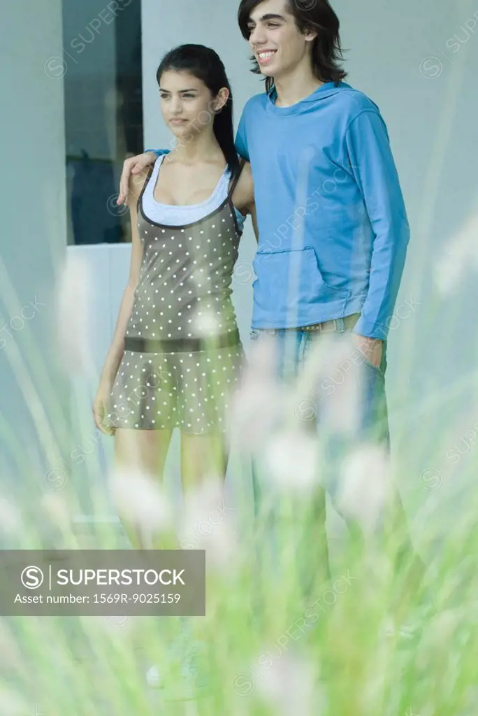 Young couple, focus on background