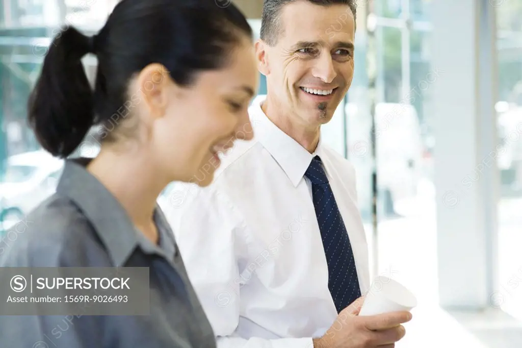 Two business associates laughing