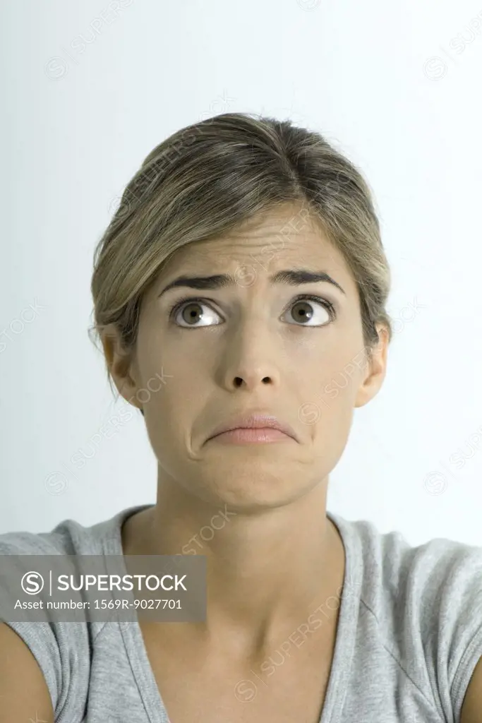 Woman making sad face, portrait