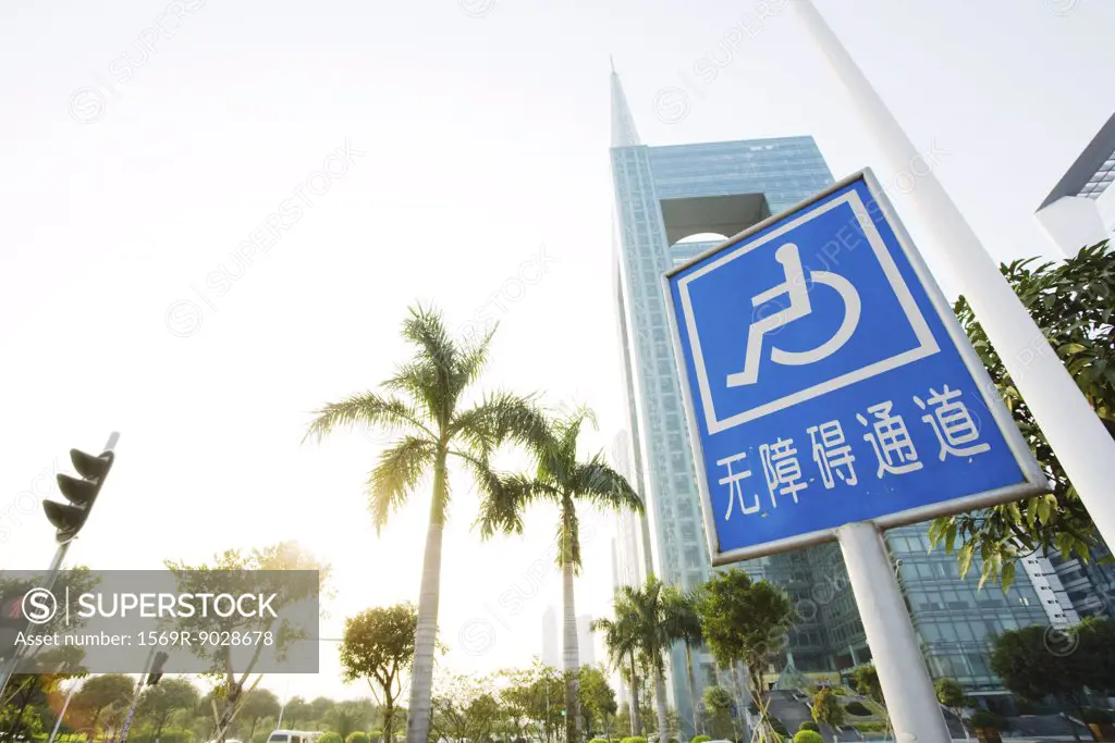 China, handicapped parking sign, low angle view
