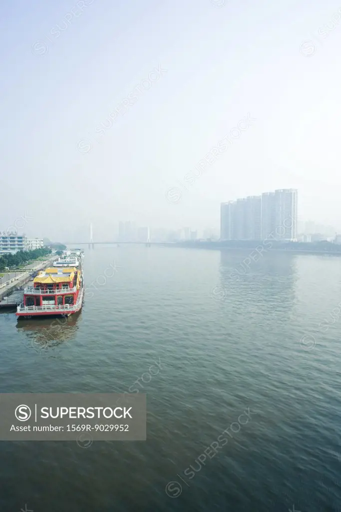 China, riverscape with barge